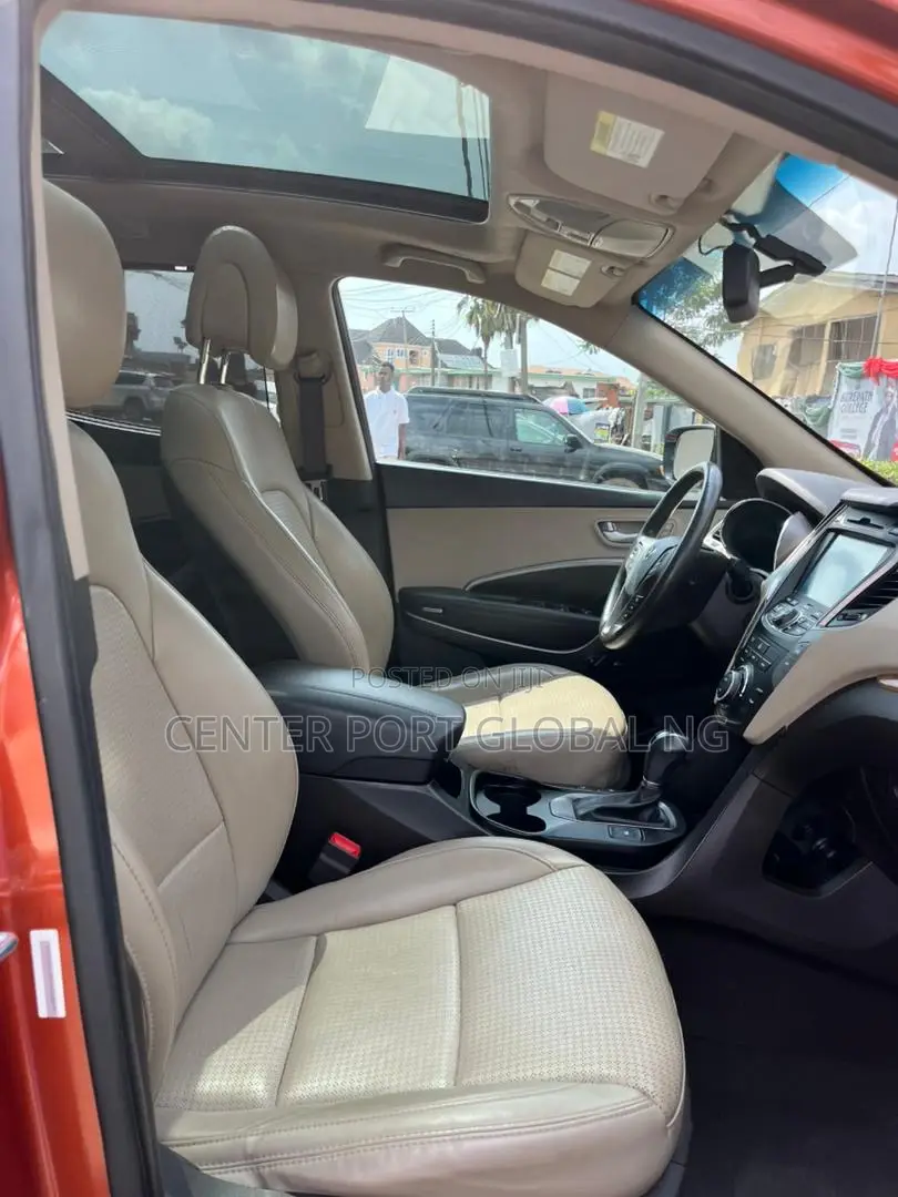 Hyundai Santa Fe GLS 4dr SUV AWD (3.3L 6cyl 6A) 2015 Orange