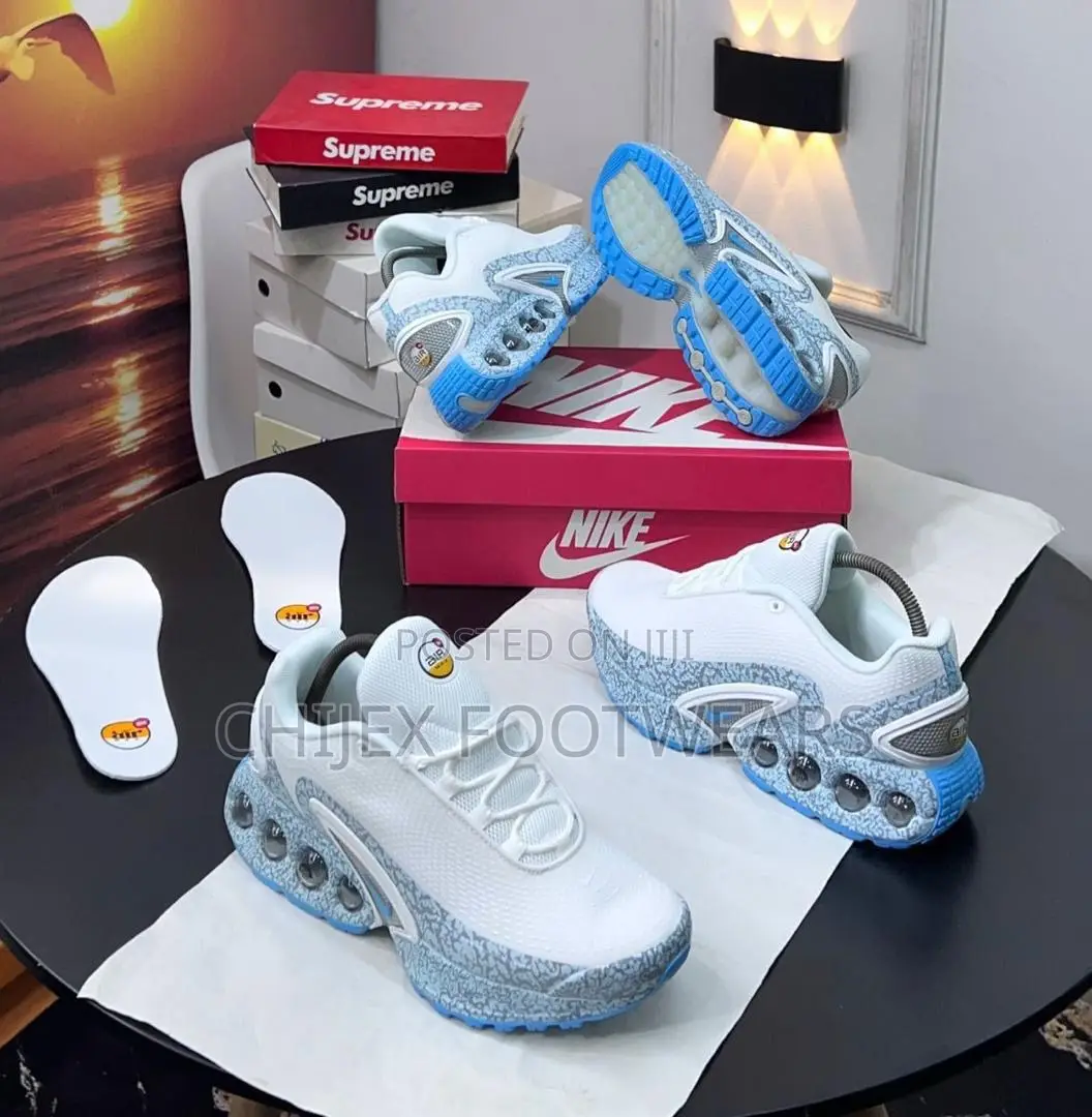 Nike Air Max Dn Sneaker, Specifically in a Blue-Accented Colorway