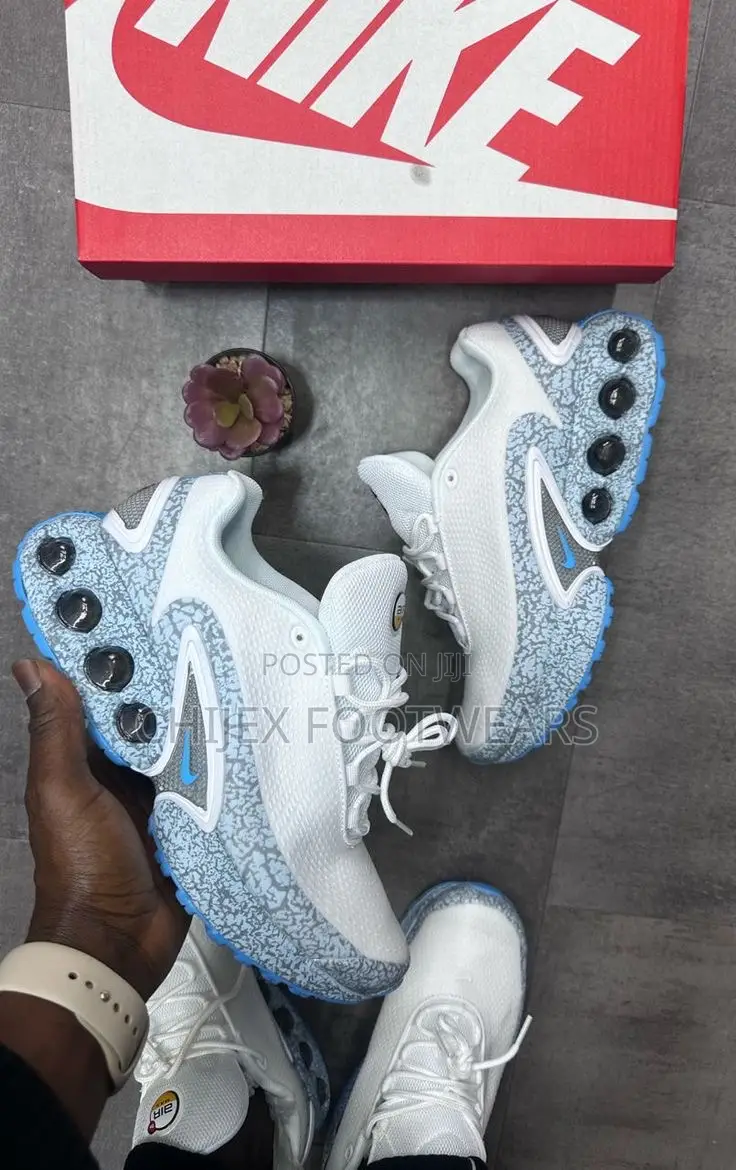 Nike Air Max Dn Sneaker, Specifically in a Blue-Accented Colorway