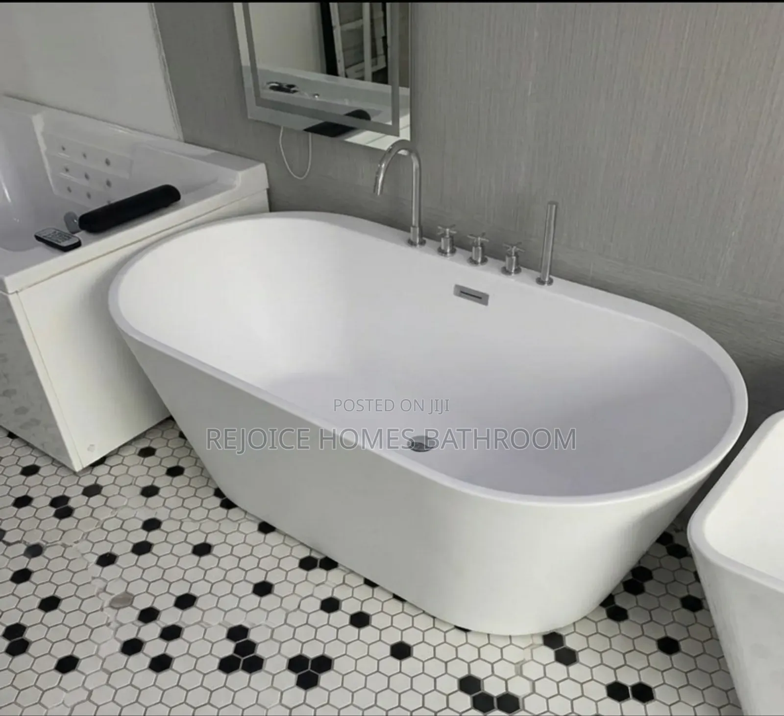 Luxury Freestanding White Bathtub With Chrome Fittings