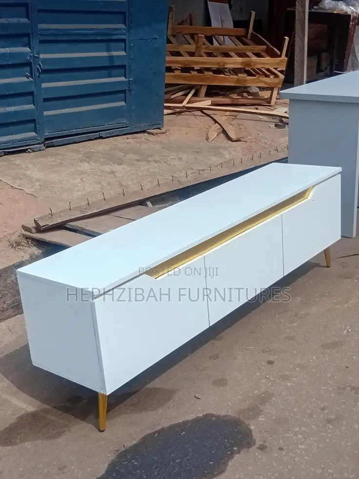 White Tv Console With Gold Tapings