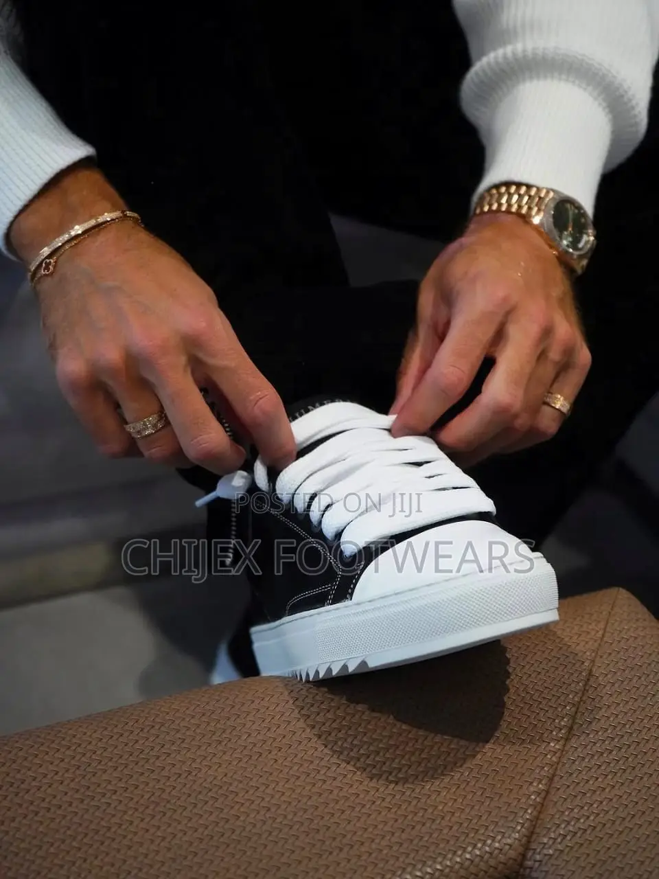 Numeris Atelier Sneakers Featuring a Black and White Design