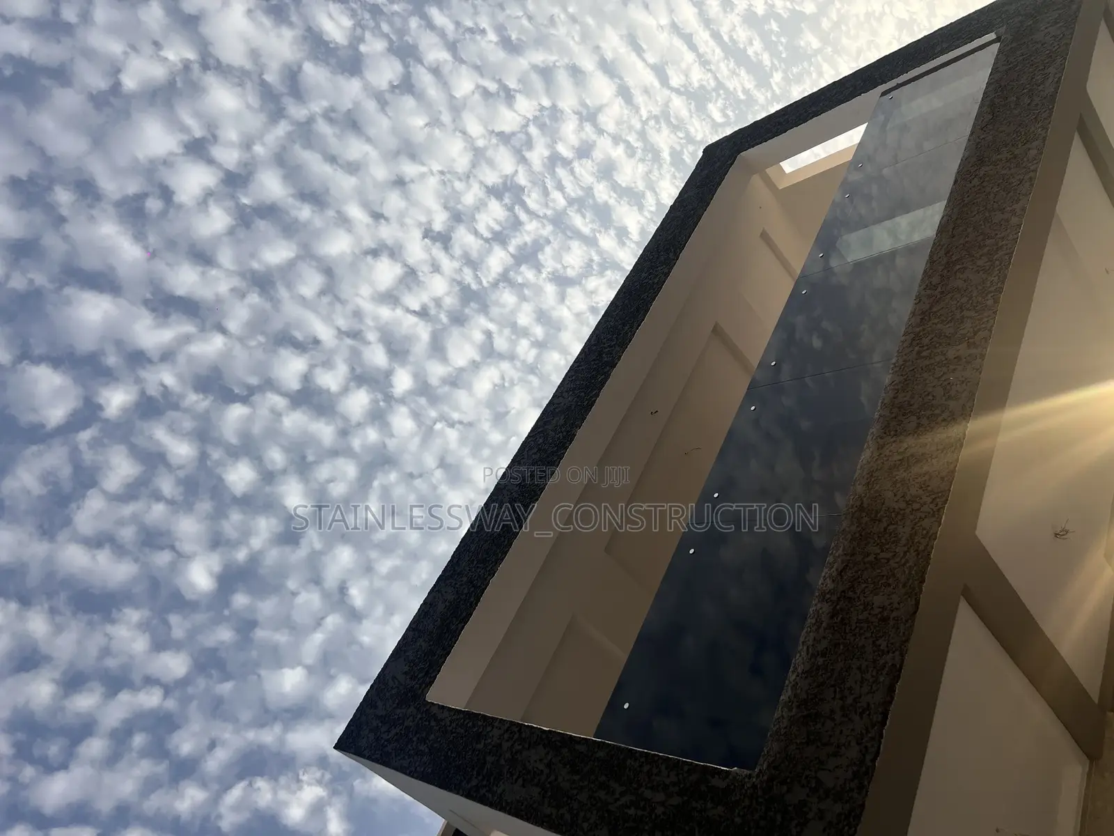 Black Glass Balcony With Stainless Handrails