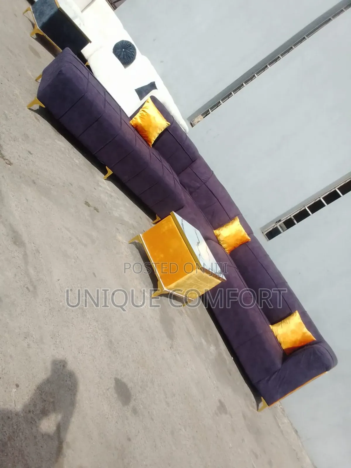 Luxury Curved Section Sofa With Throw Pillows and Center Table