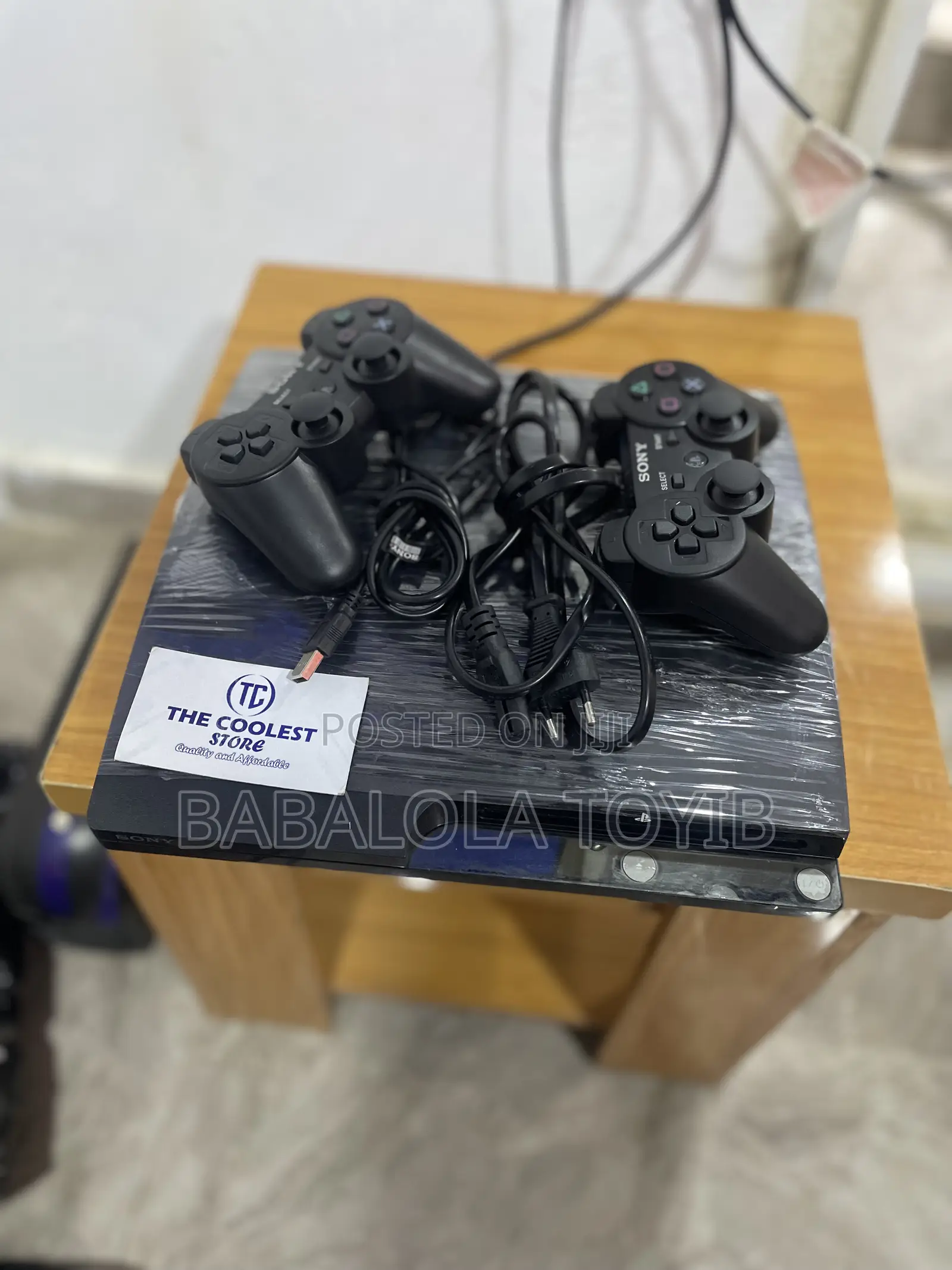 Playstation 3 Slim 2pads 10-12games on It