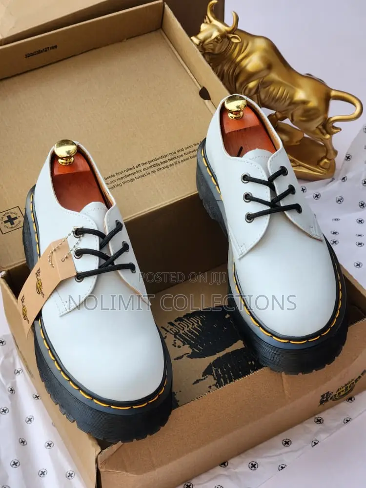 White Dr Martens Leather Shoes With Black Sole