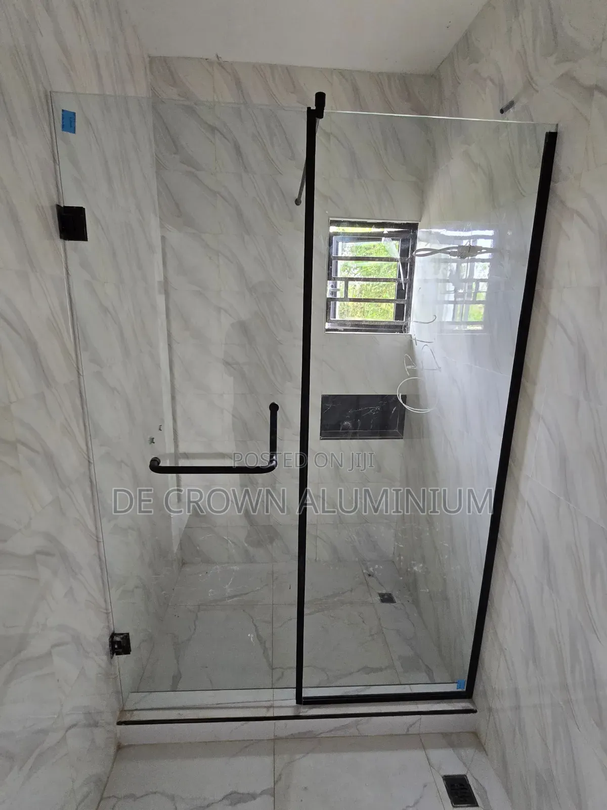 Luxury Tempered Glass Shower Cubicle With Black Accessories.