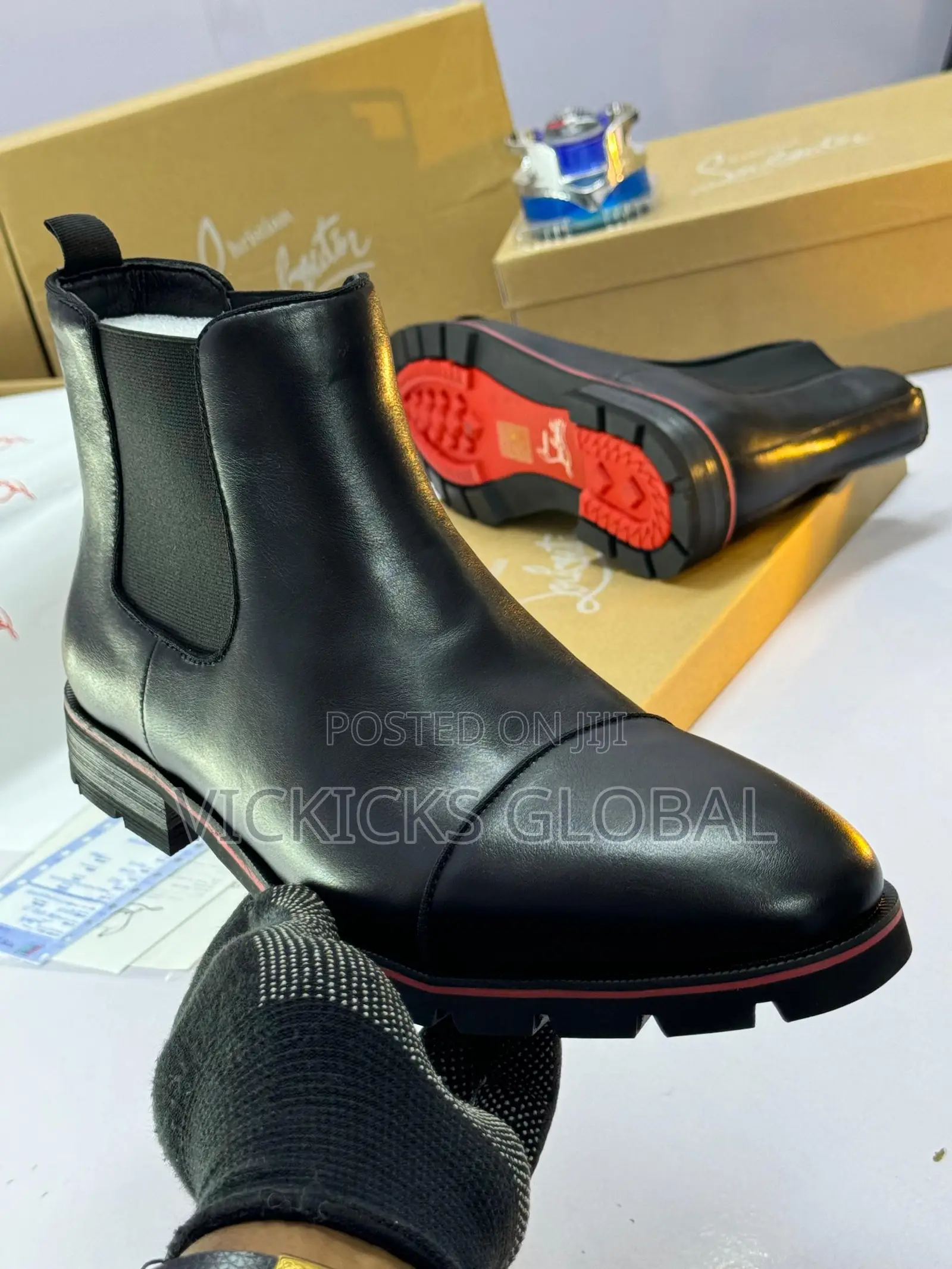 Christian Louboutin Leather Chelsea Boot With Signature Red Sole