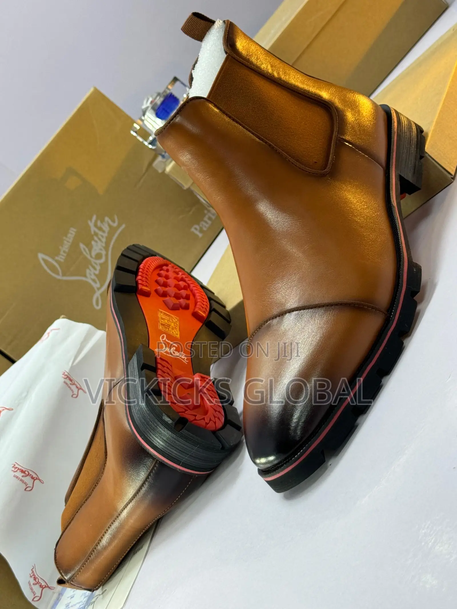 Christian Louboutin Leather Chelsea Boot With Signature Red Sole
