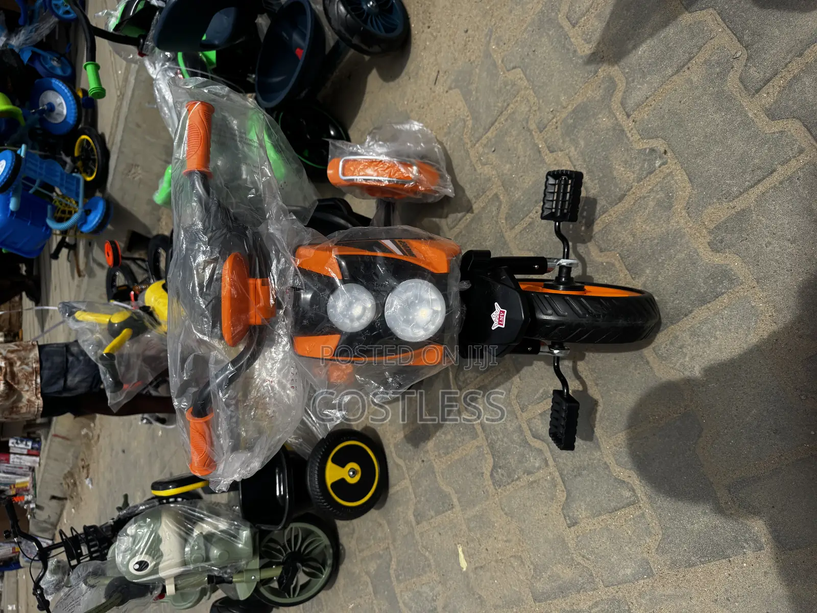 Three-Wheeled Pedal-Powered Ride-on Bicycle for Toddlers.