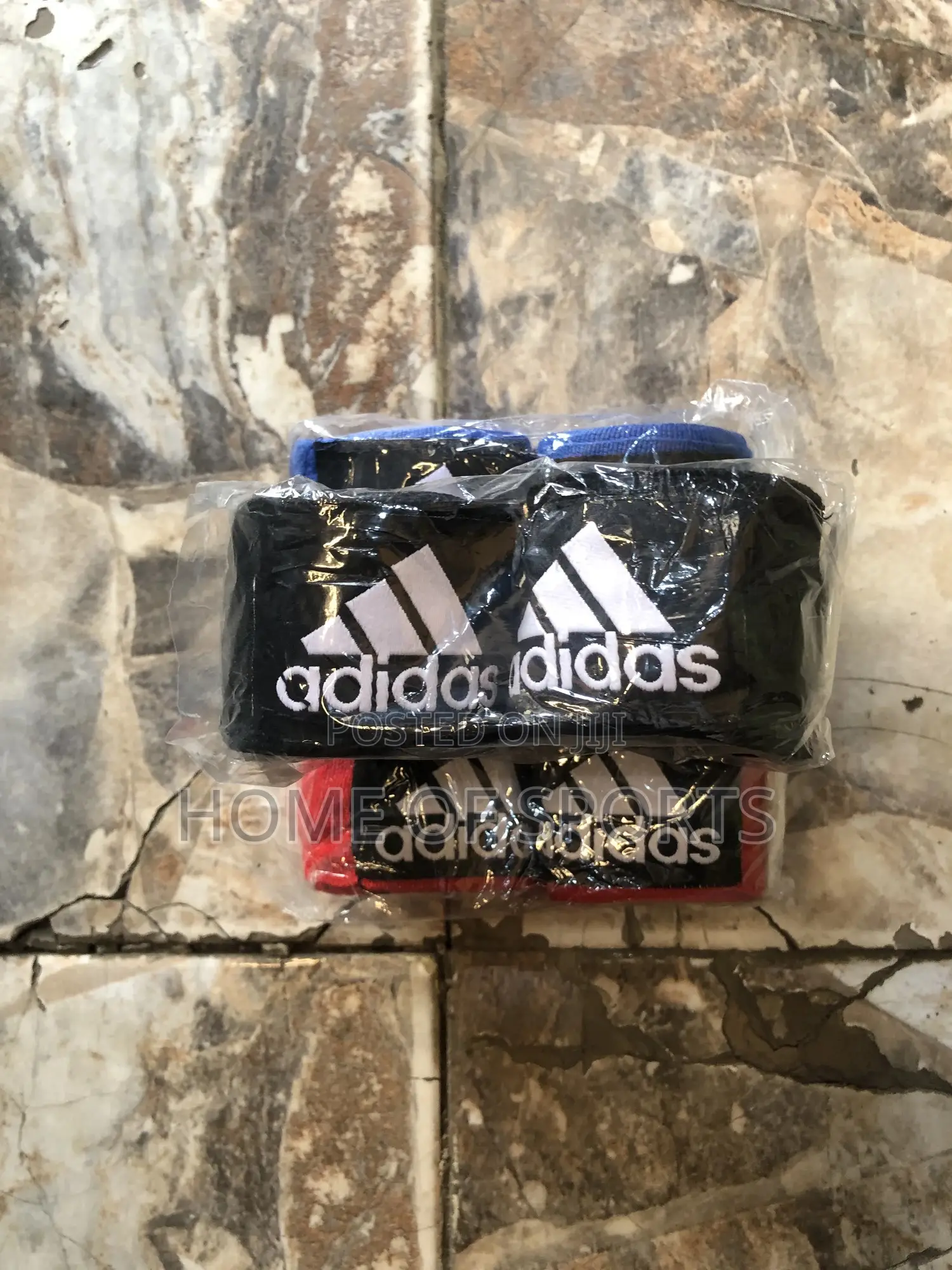 A Pair of Adidas Boxing Hand