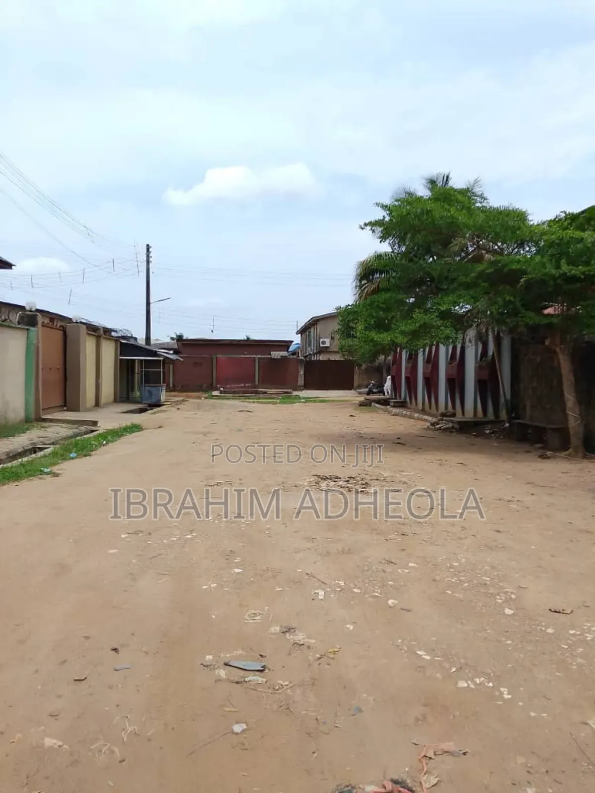 Fenced and Gated Dry Land on Plot of Land.
