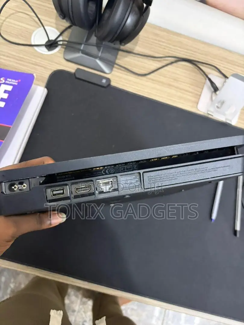 Neatly Used Ps4 Console With 2 Controllers and Installed Games