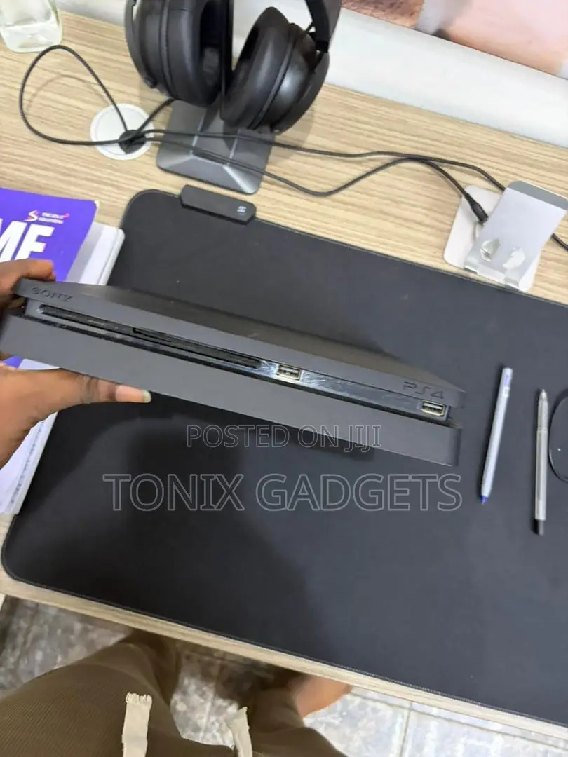 Neatly Used Ps4 Console With 2 Controllers and Installed Games