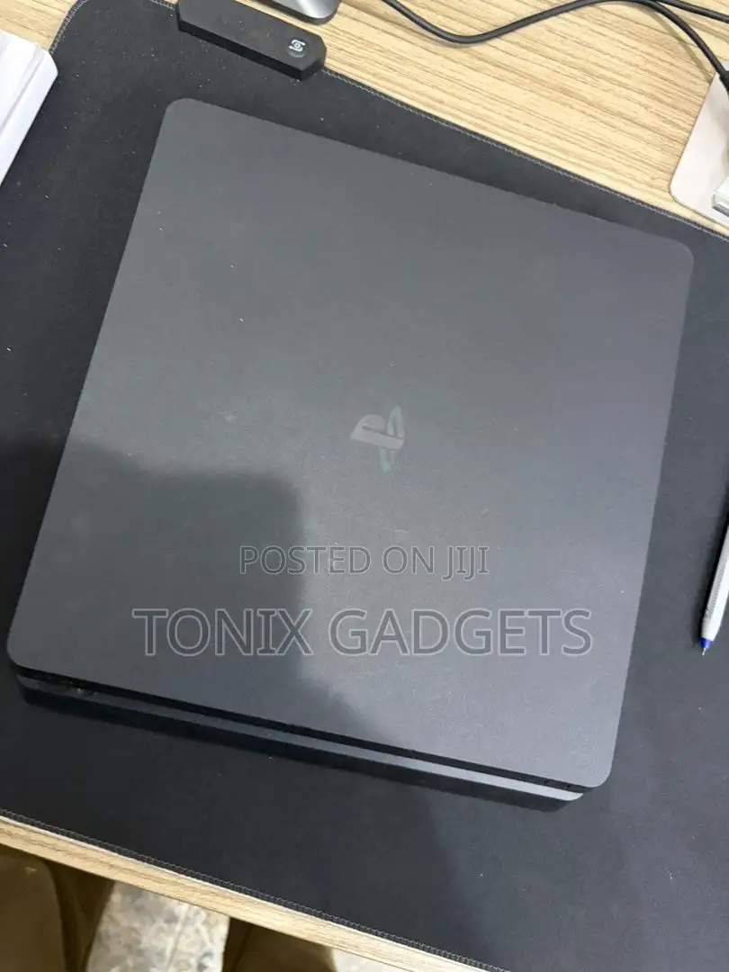Neatly Used Ps4 Console With 2 Controllers and Installed Games