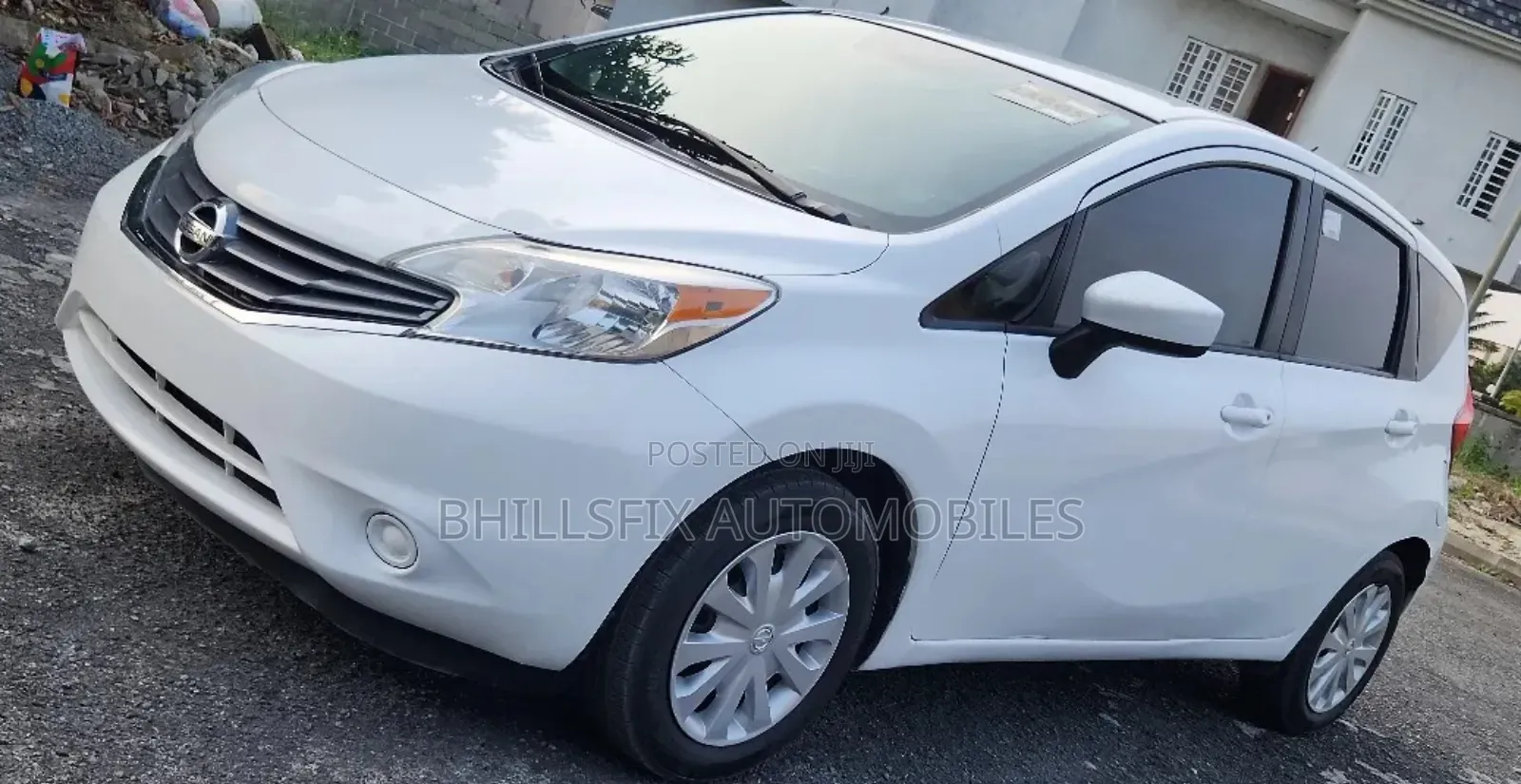 Nissan Versa 1.6 SV 4dr Sedan (1.6L 4cyl CVT) 2014 White
