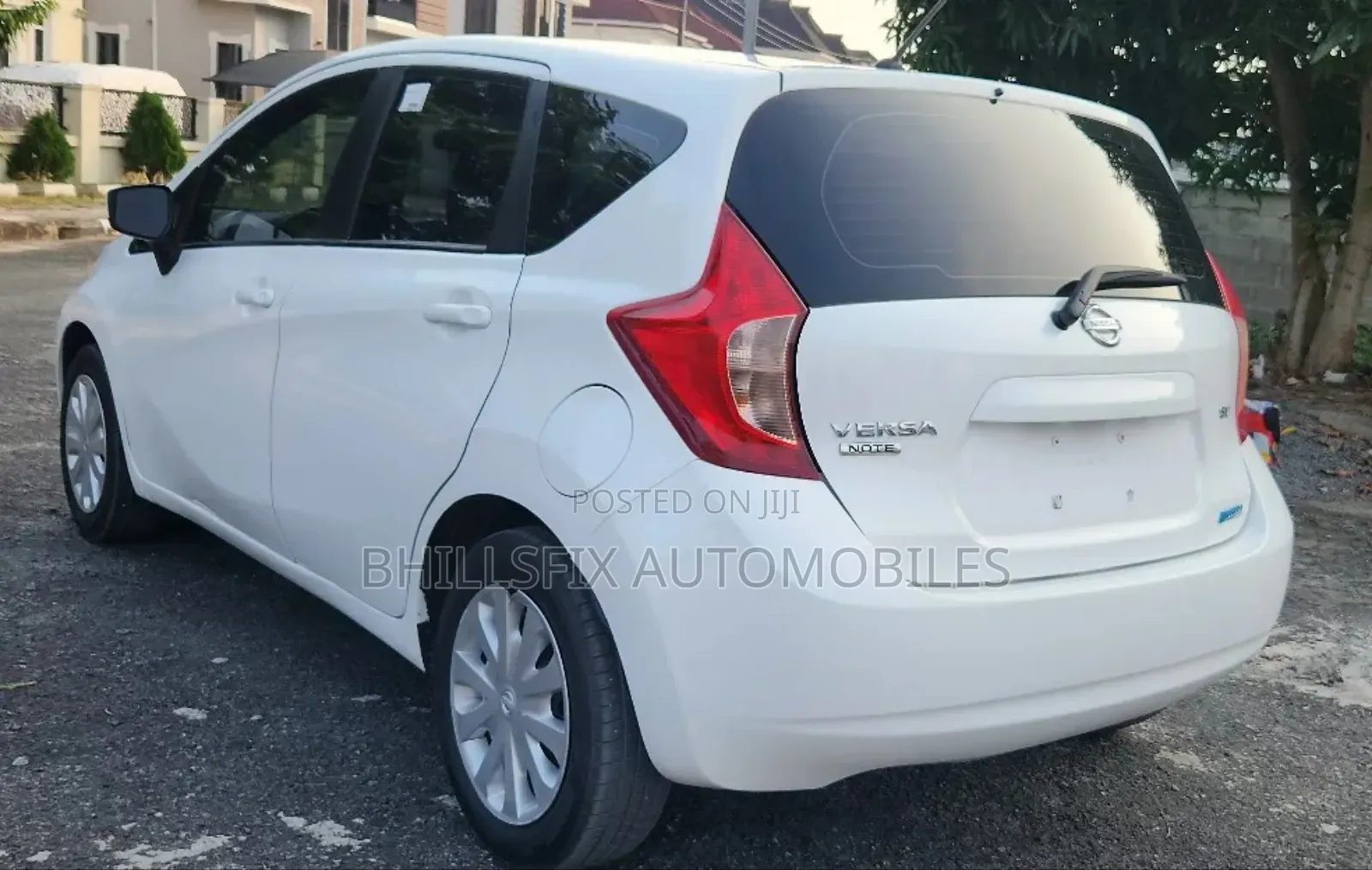 Nissan Versa 1.6 SV 4dr Sedan (1.6L 4cyl CVT) 2014 White