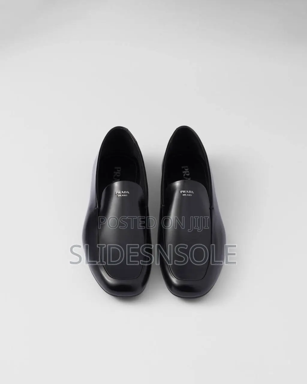 Elegant Prada Brushed Leather Loafers