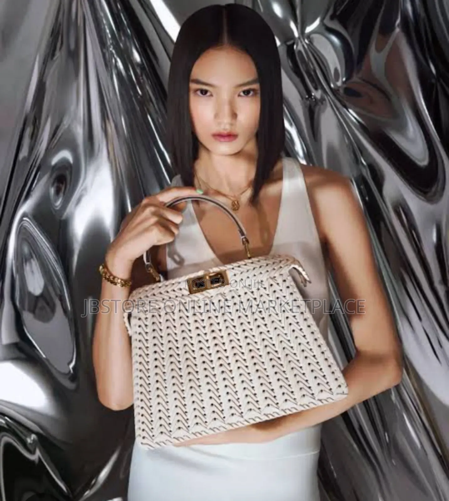 Fendi Peekaboo Iseeu Handbag Crafted With a Woven Leather Design