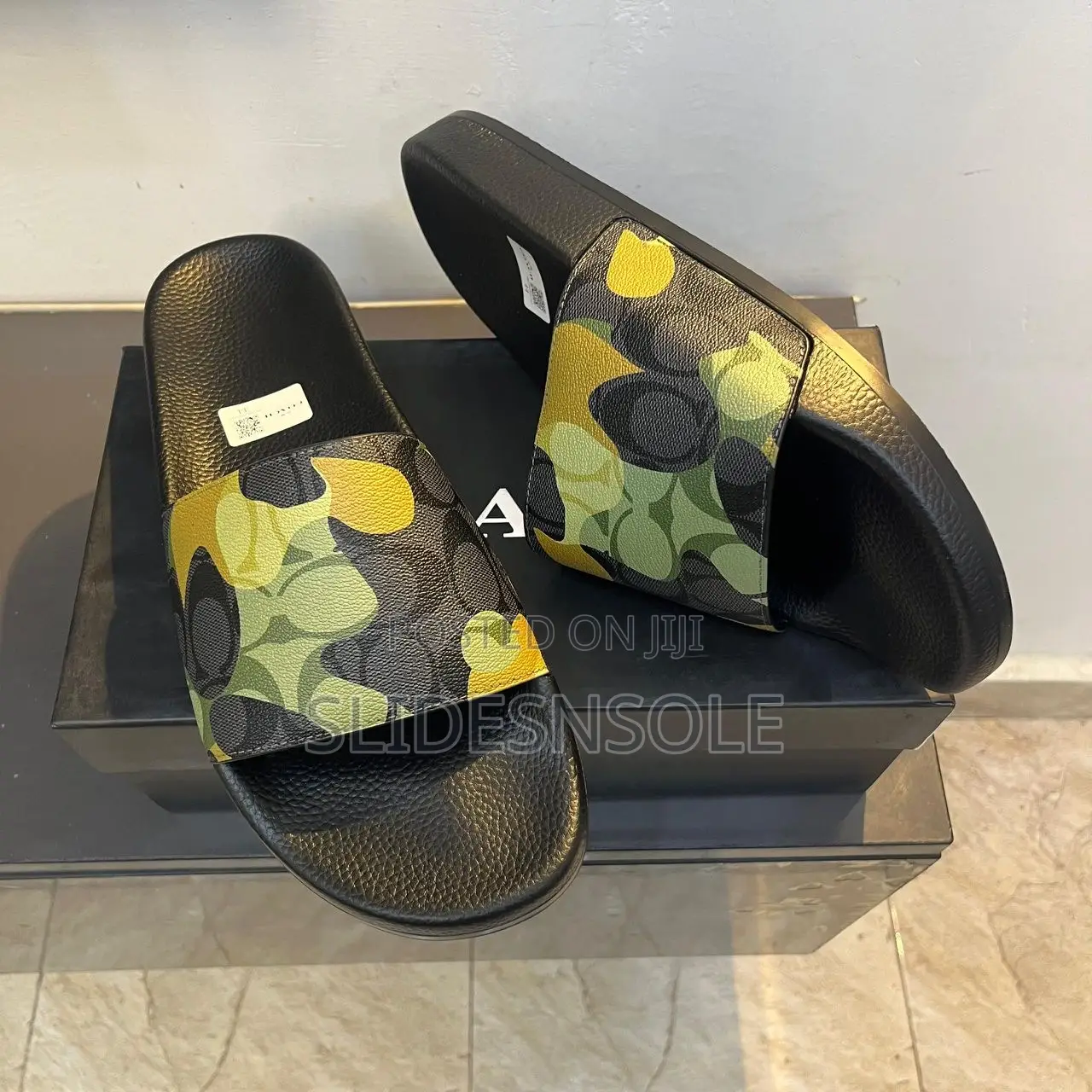 The Coach Signature Camo Slide