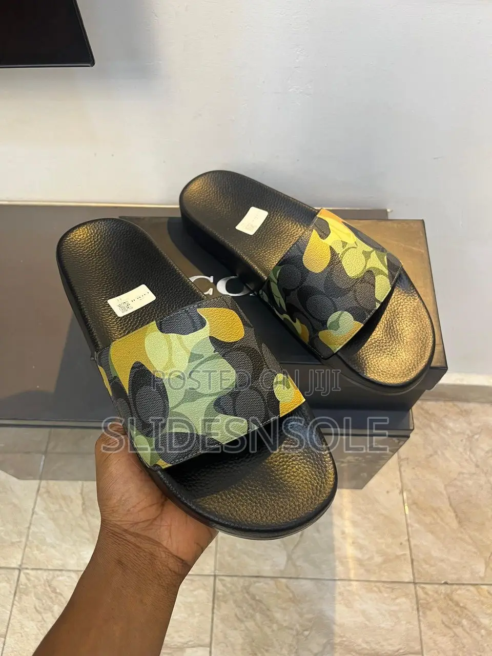The Coach Signature Camo Slide