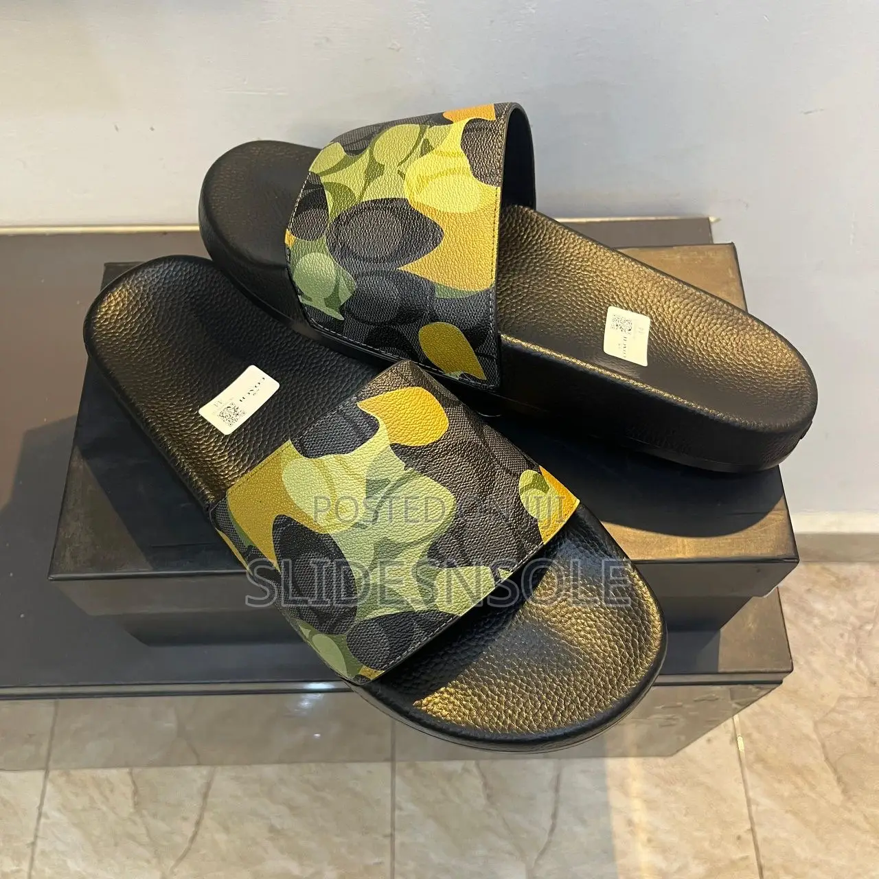 The Coach Signature Camo Slide