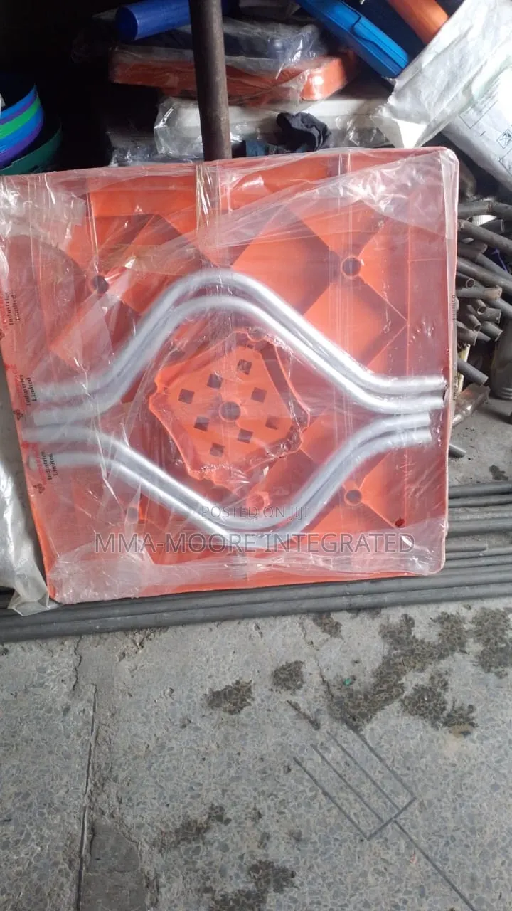 Plastic Table With X-Shaped Iron Legs