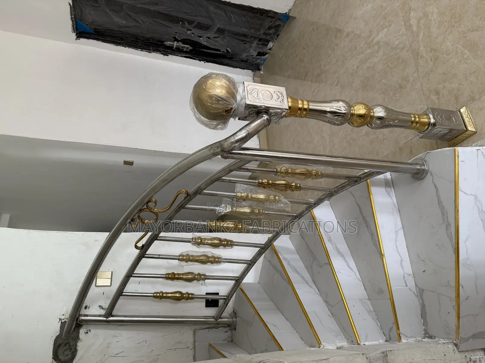 Stainless Railings With Gold Designs