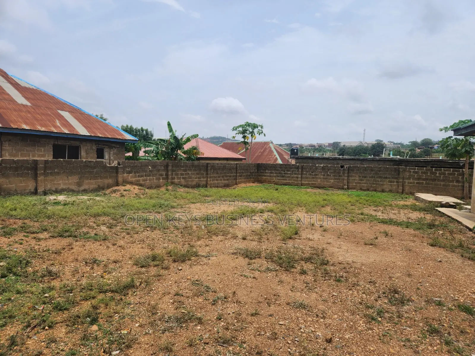 A Fenced Cut-Out Plot of Land