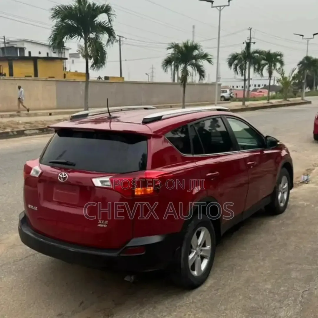 Toyota RAV4 XLE AWD (2.5L 4cyl 6A) 2013 Red