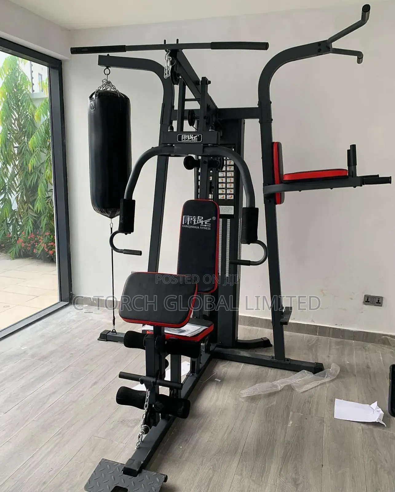 3-Station Multi-Gym With a Punching Bag and Sit-Up Bench,