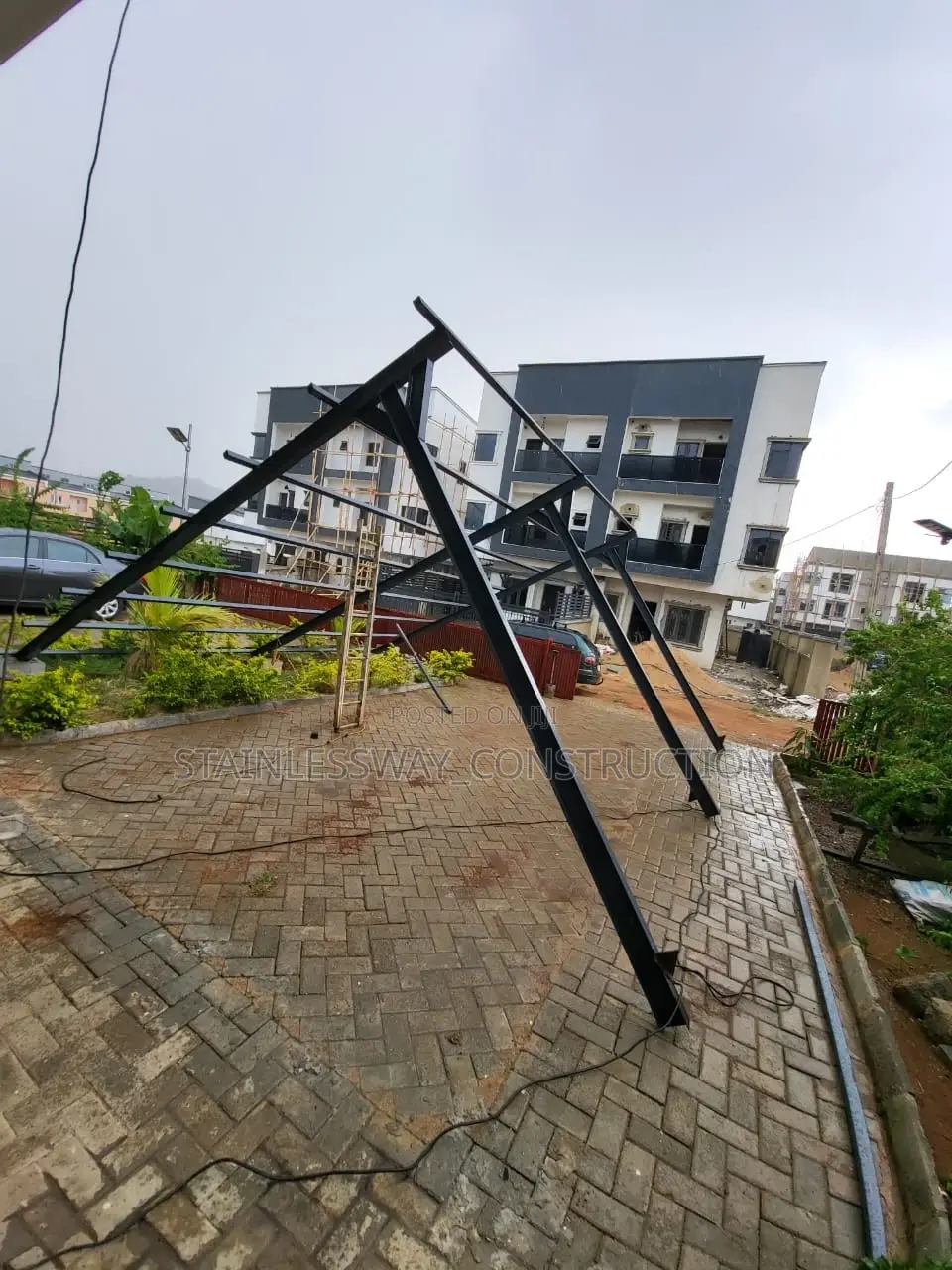 Carport With Gear Broker for Two Cars Parking Space
