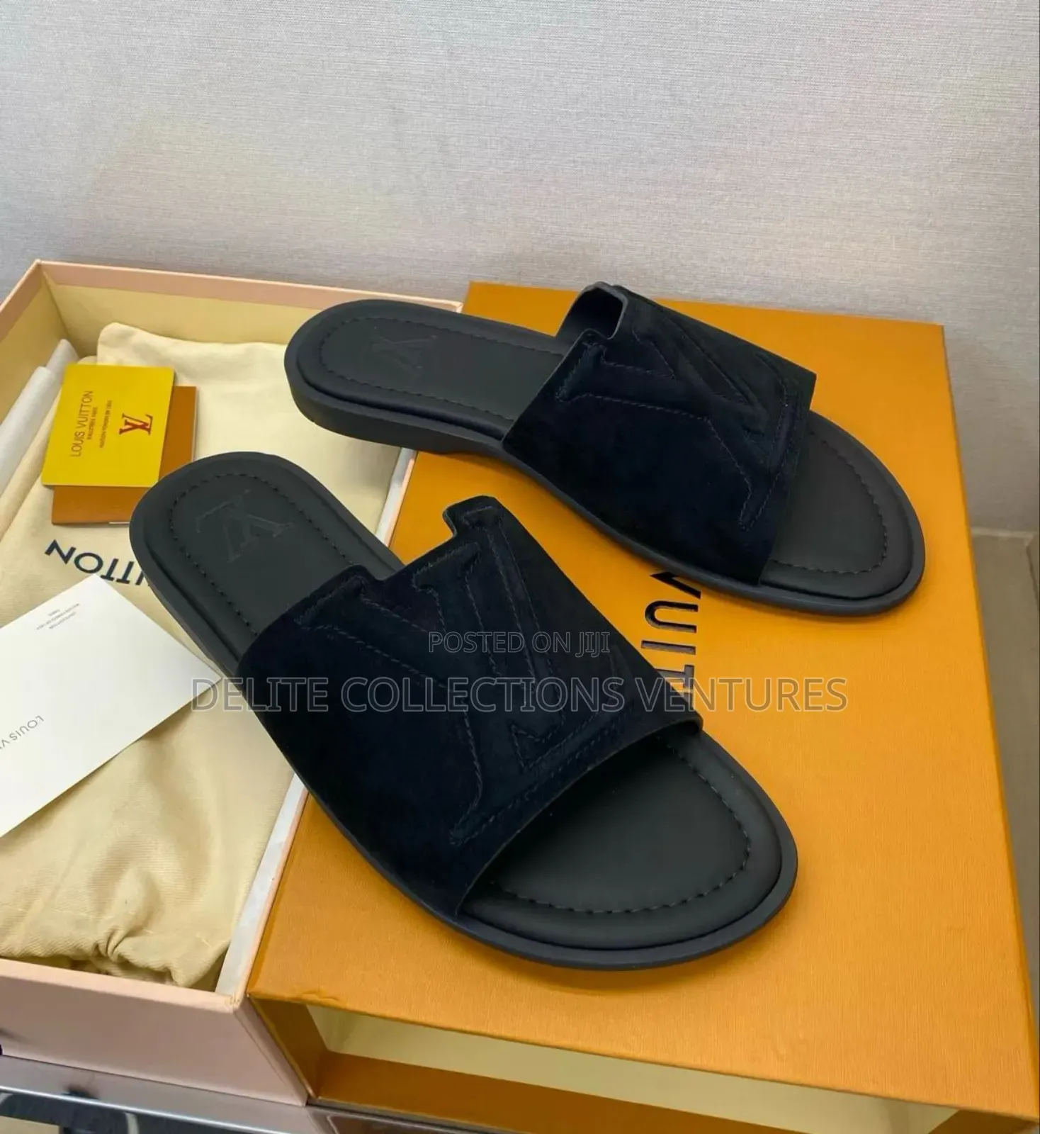 Luxury Update  
Louis Vuitton Portofino Mule in Suede.