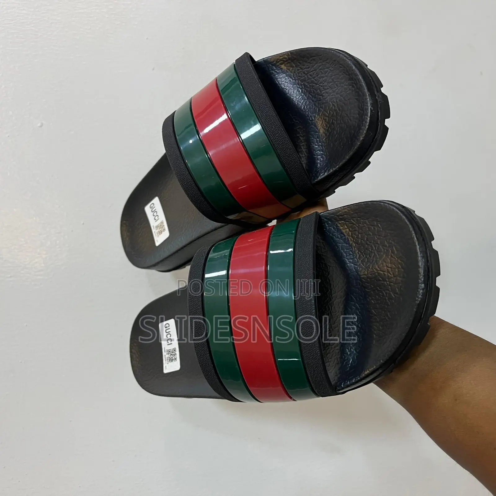 Gucci Men's Web Rubber Slide Sandal.