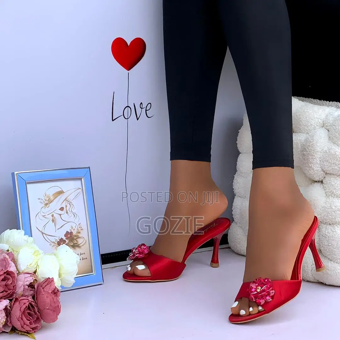 Lovely Slippers With a Rose Brooch