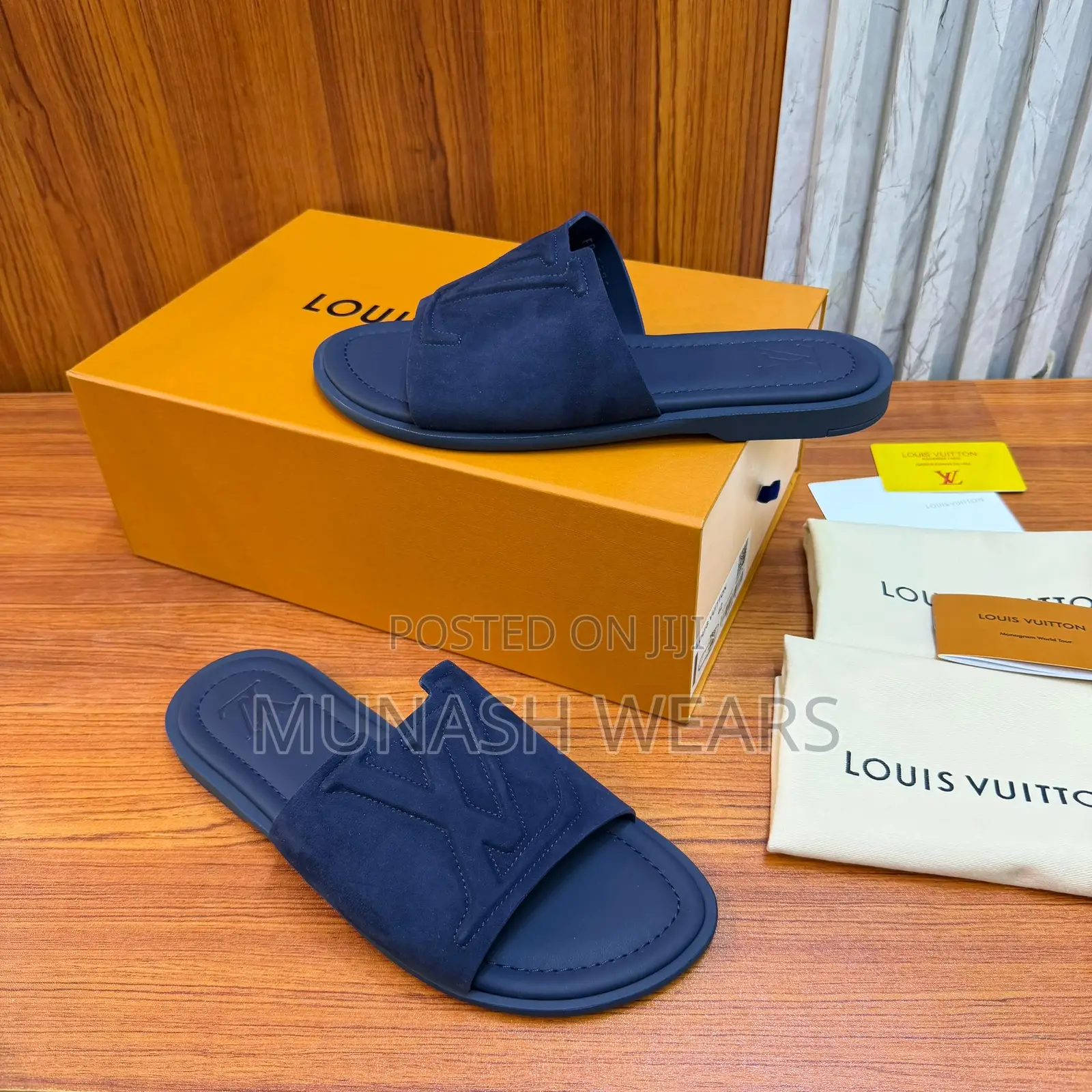 Louis Vuitton Slipers Available in Blue and Black Suede