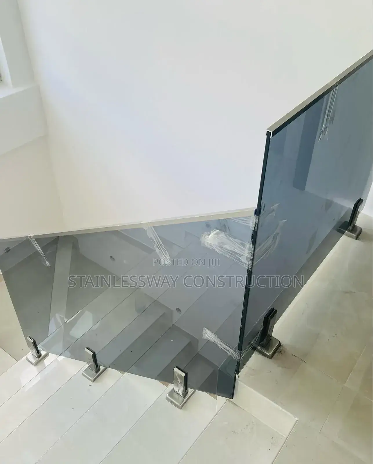 Precision Glass Dark Grey on Staircase Rail