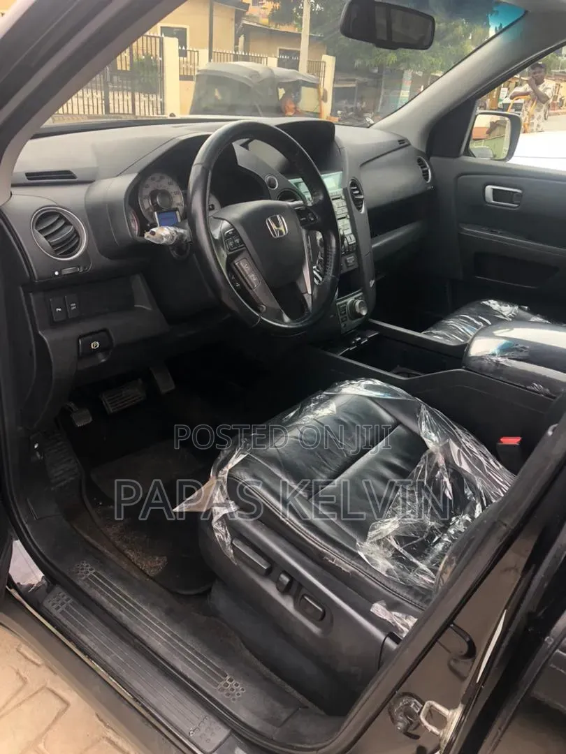 Honda Pilot Touring w/RES/Navi 4WD (3.5L 6cyl 5A) 2011 Black