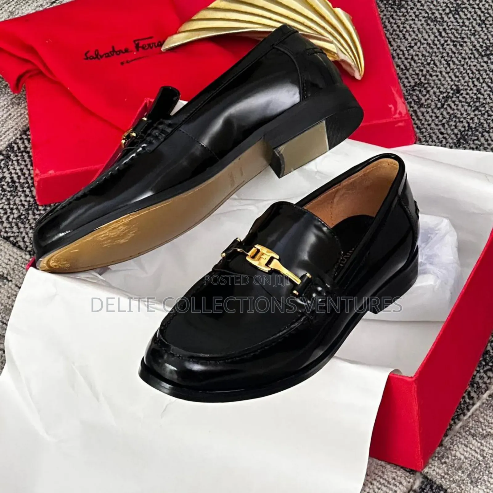 Update  
Salvatore Ferragamo Embossed-Gancio Loafers.