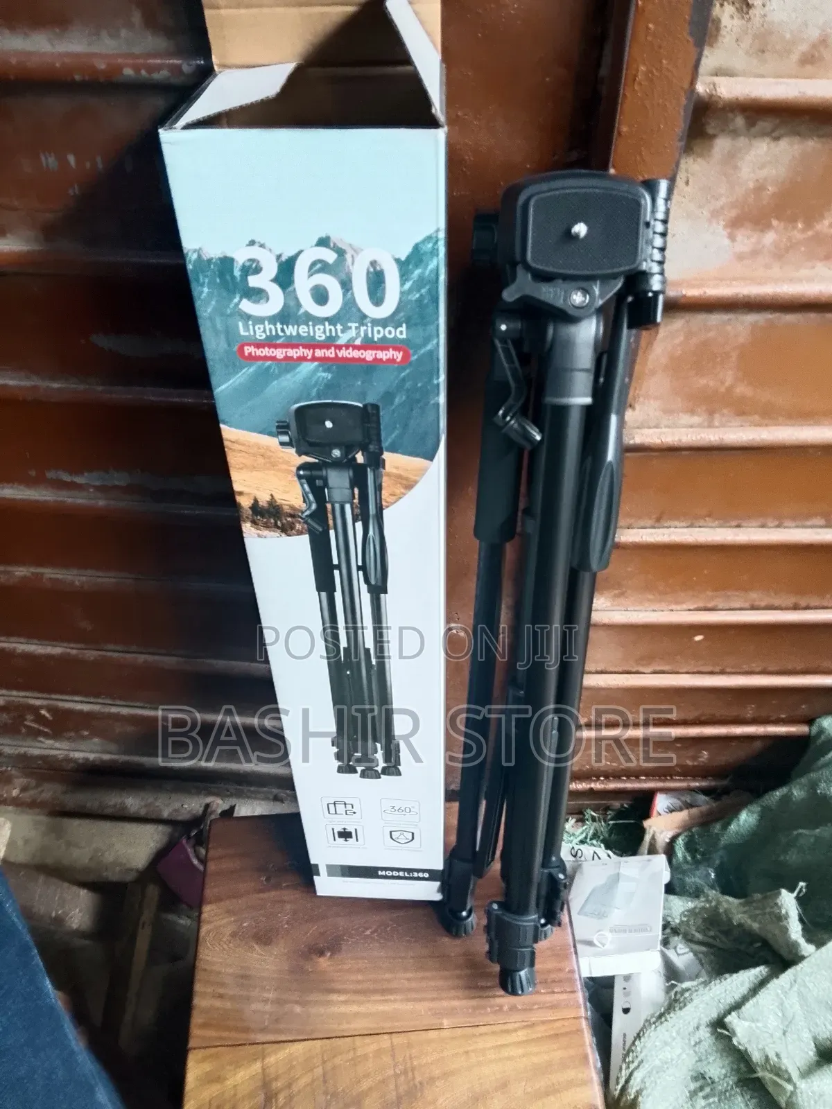 Generic 360 Lightweight Tripod Used For Photography And Videography.