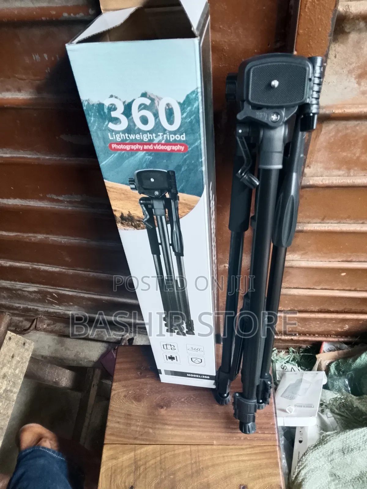 Generic 360 Lightweight Tripod Used For Photography And Videography.