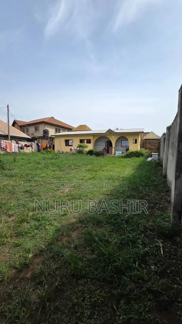 Well Fenced and Gated Plot of Land at Progressive Estate Akala Express