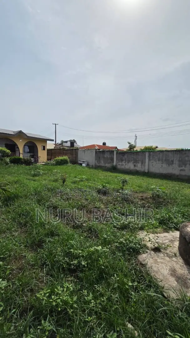 Well Fenced and Gated Plot of Land at Progressive Estate Akala Express