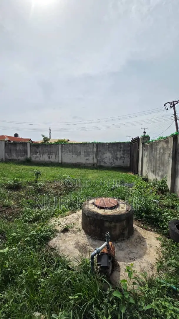 Well Fenced and Gated Plot of Land at Progressive Estate Akala Express
