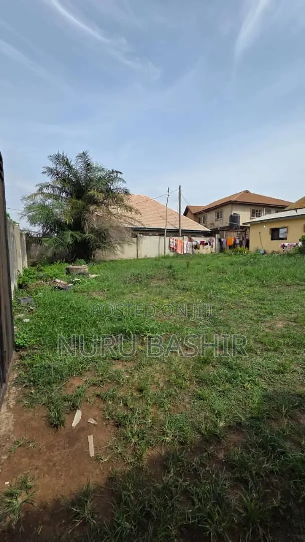 Well Fenced and Gated Plot of Land at Progressive Estate Akala Express