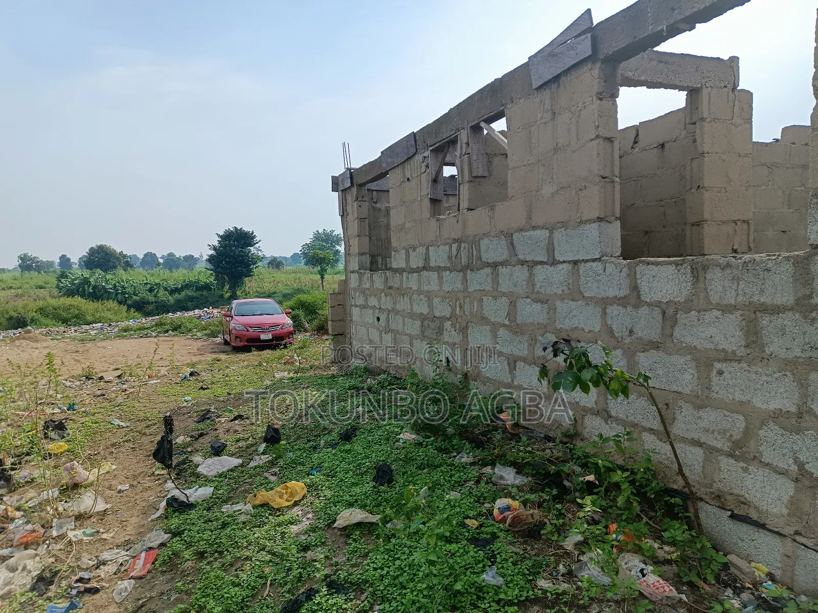 Over 1,000 SQM of Fenced Land With Borehole 5 Units of S/C Carcass
