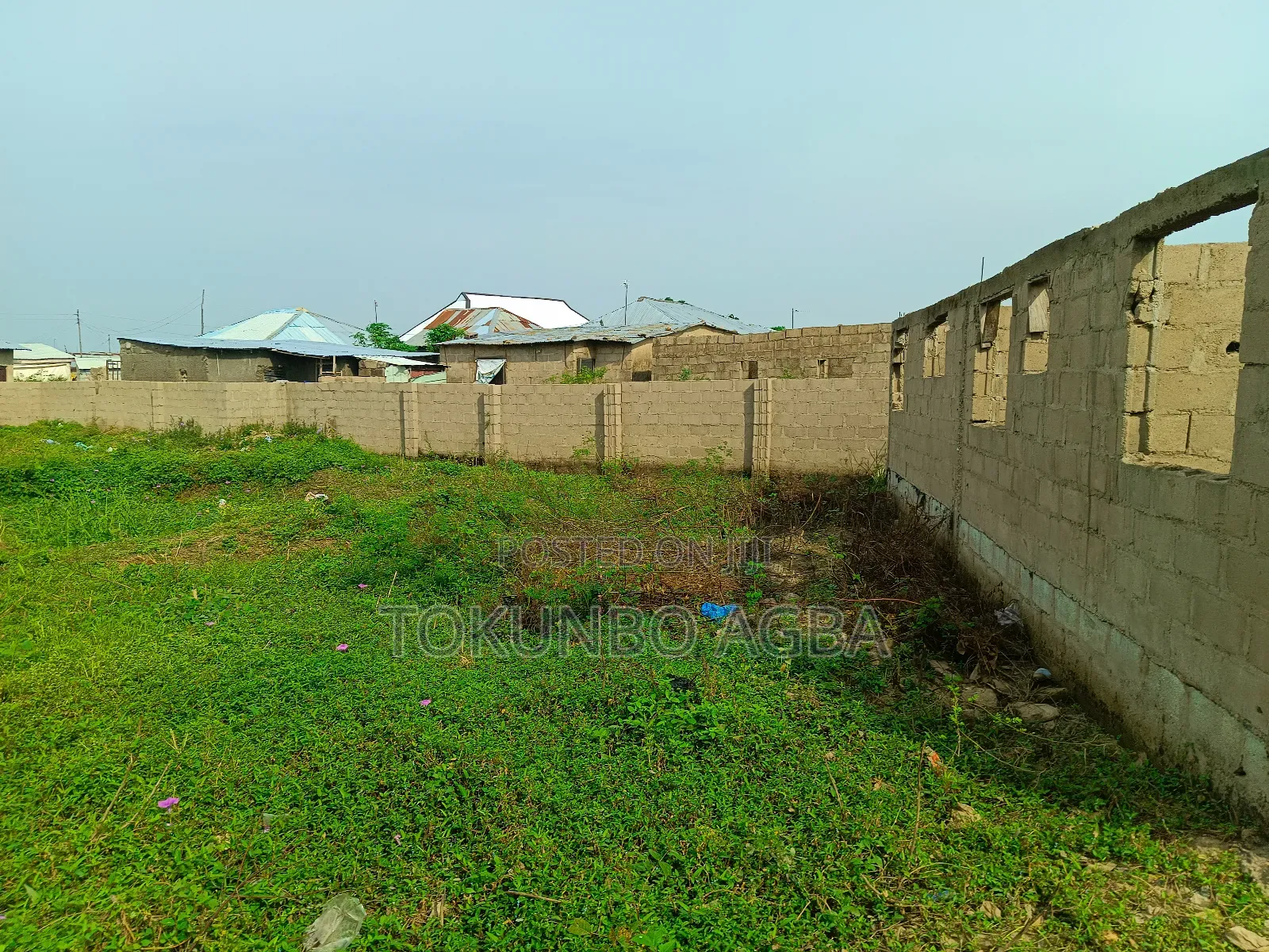 Over 1,000 SQM of Fenced Land With Borehole 5 Units of S/C Carcass