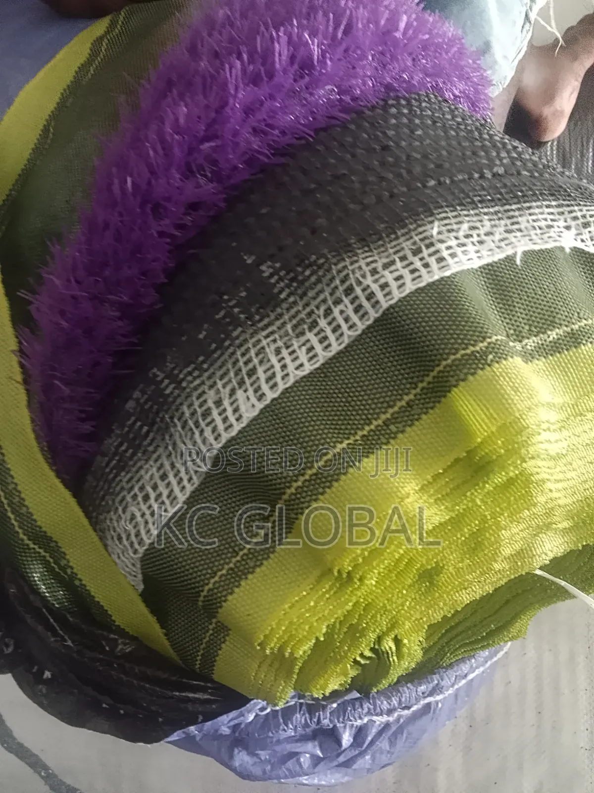 Artificial Grass Available in Different Sizes and Colors.