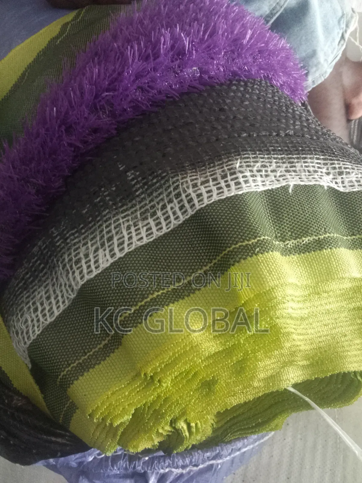 Artificial Grass Available in Different Sizes and Colors.