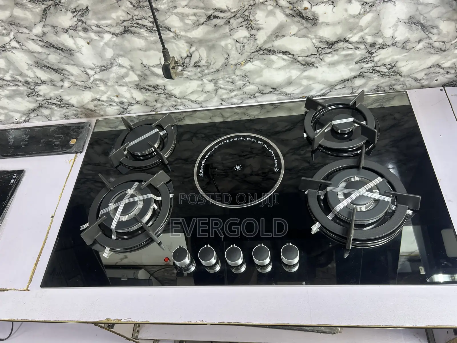 4 Gas and 1 Electric Built in Burner